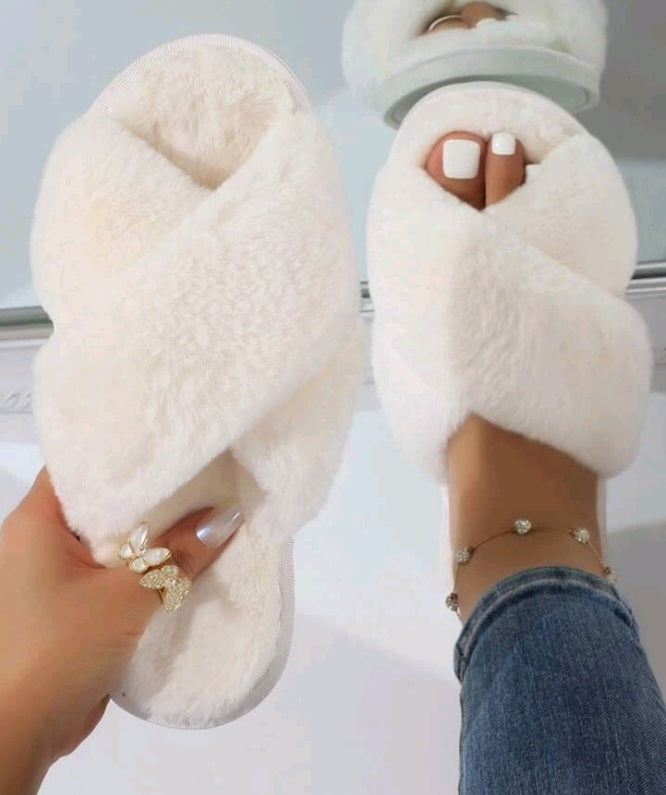 Pantuflas blancas abiertas