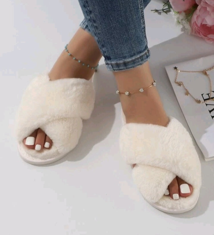 Pantuflas blancas abiertas